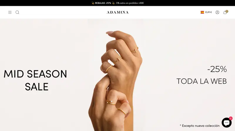 Adamina home page with a mid-season sale banner and an announcement bar with the discount