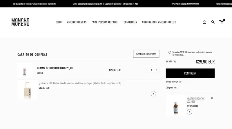 Moncho Moreno cart page with a free shipping message, a tote bag offer and a suggested product